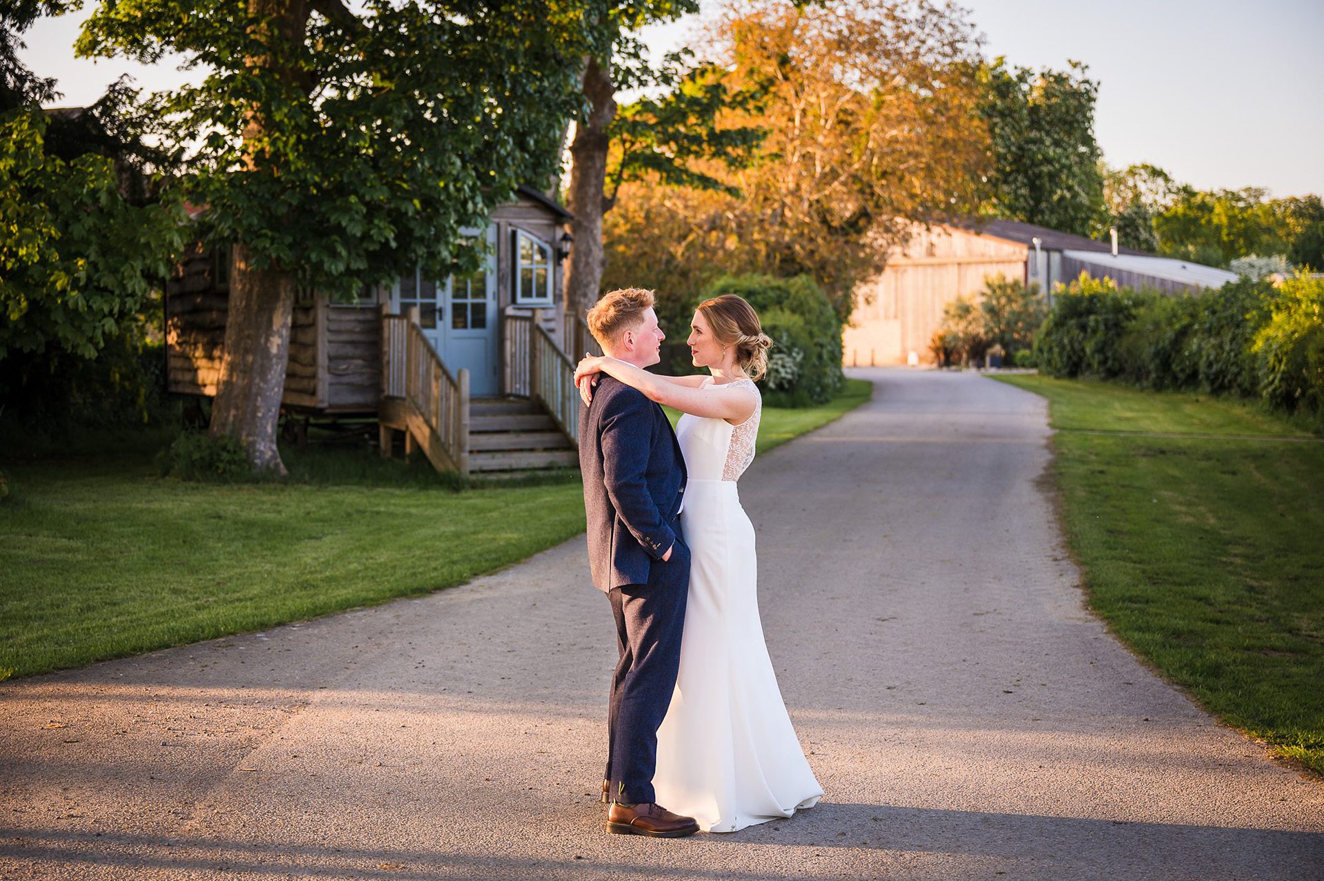 bride and groom posing in the countryside around Hornington Manor Wedding